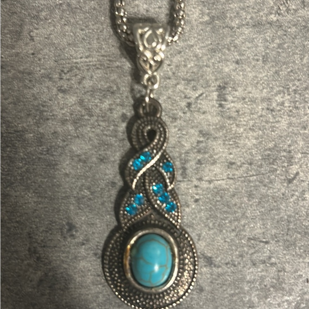 Elegant Silver and Turquoise Pendant Necklace